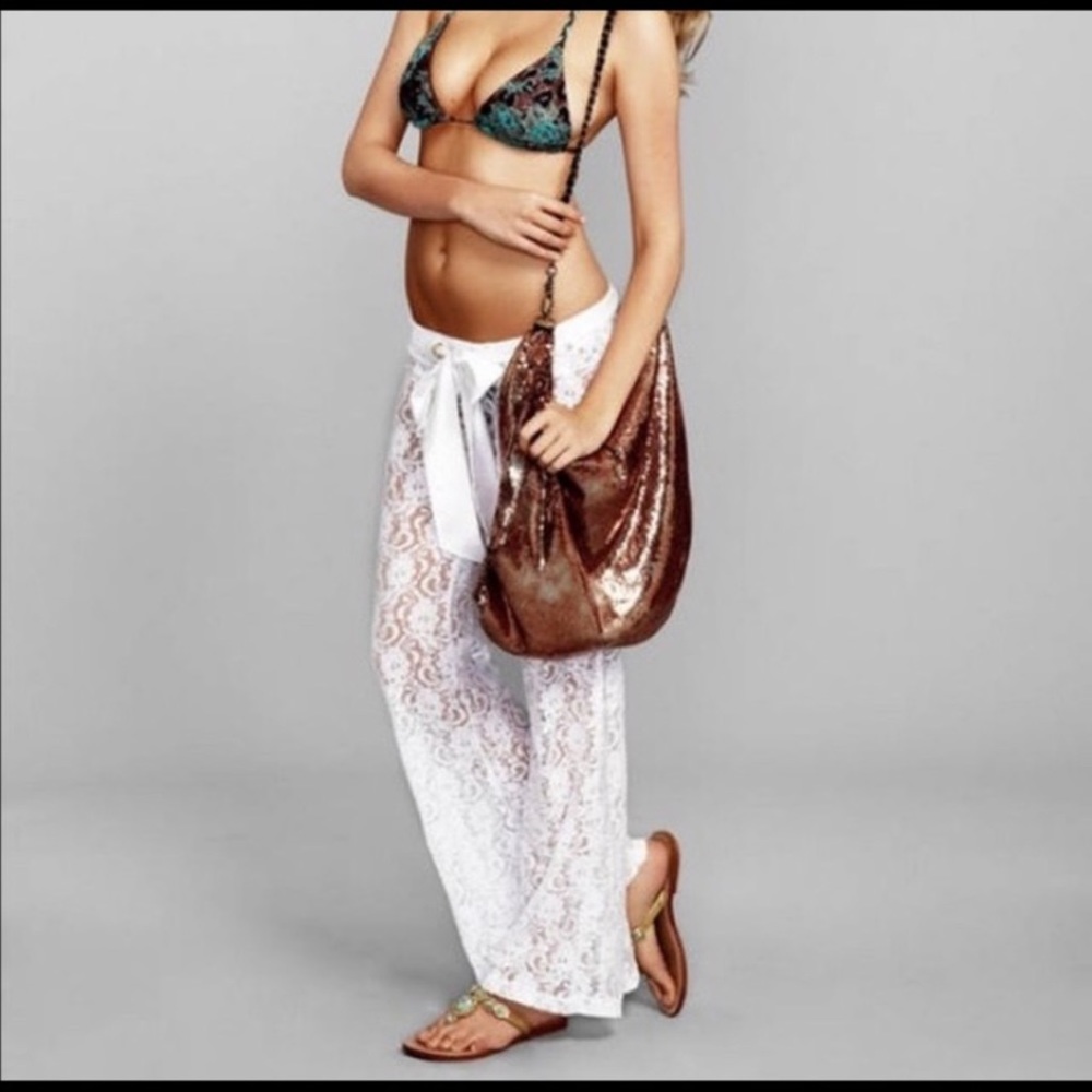 Iso white lace beach bunny bombshell pants size small/medium. Do not buy